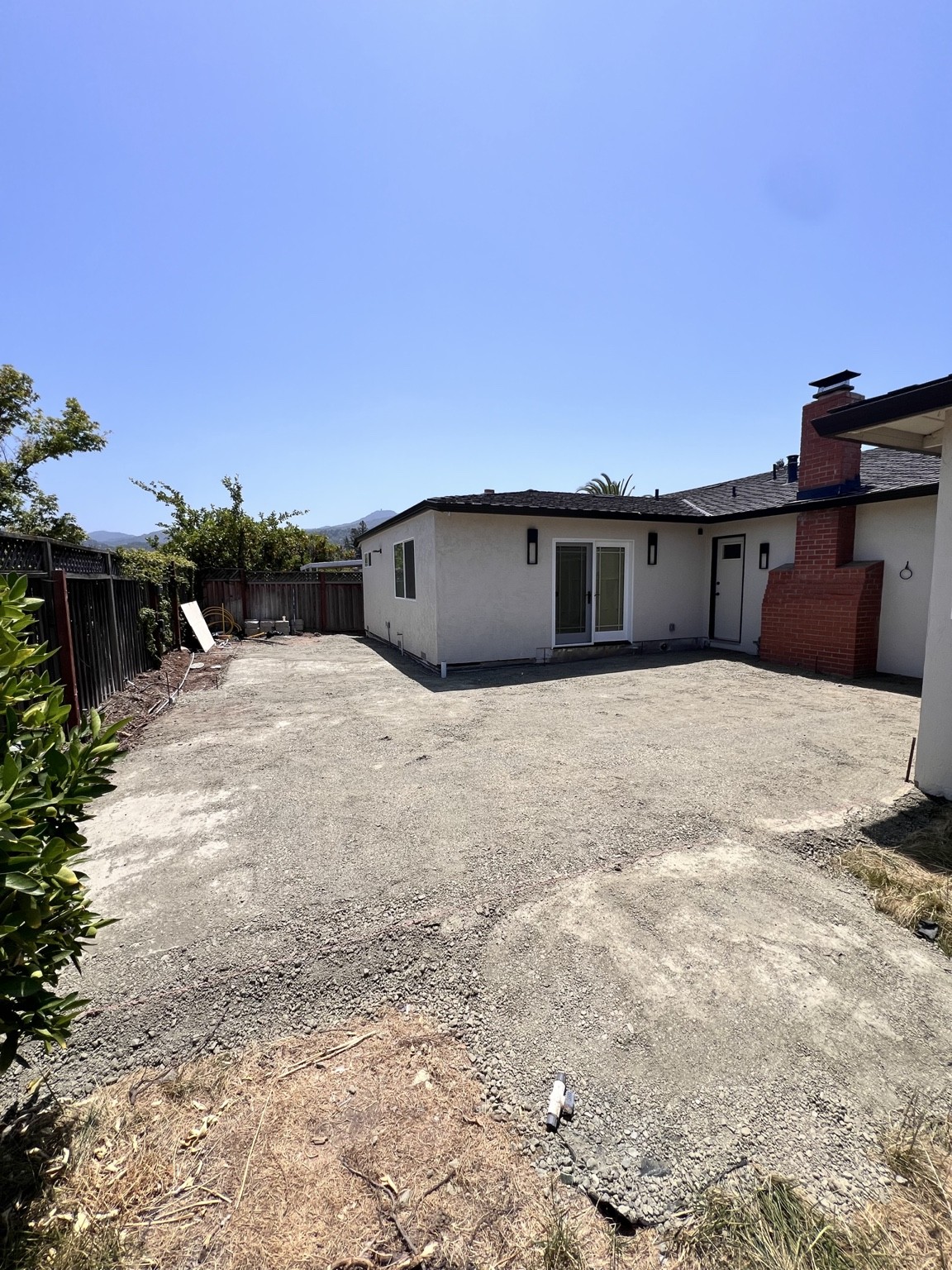 Before · Backyard patio site preparation