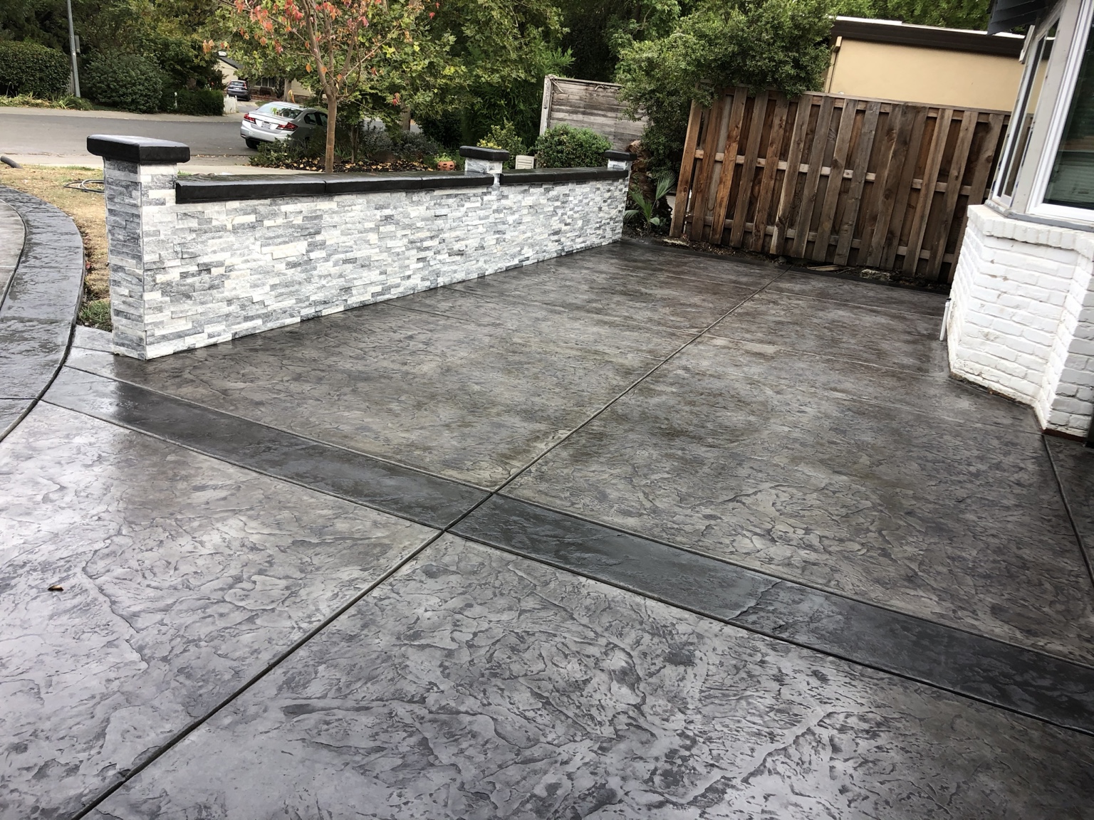 Stamped patio and retaining wall